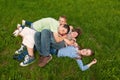 Happy teenage friends having fun in the grass Royalty Free Stock Photo