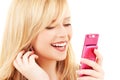 Happy teenage girl with cell phone Royalty Free Stock Photo