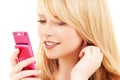 Happy teenage girl with cell phone Royalty Free Stock Photo