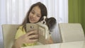 Happy teenage girl doing selfie with her dog Royalty Free Stock Photo