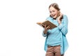 Happy teenage girl in eyeglasses reading book Royalty Free Stock Photo