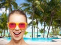 Happy teenage girl in pink sunglasses Royalty Free Stock Photo