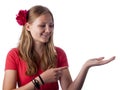 Happy teenage girl showing something on the palm of her hand Royalty Free Stock Photo