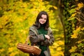 Happy teenage girl smiling. Autumn portrait of a beautiful young girl holds basket. Royalty Free Stock Photo