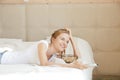 Happy teenage girl with TV remote and popcorn Royalty Free Stock Photo