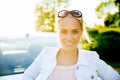 Happy teenage girl or young woman near car Royalty Free Stock Photo