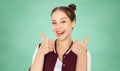 Happy teenage student girl showing thumbs up Royalty Free Stock Photo