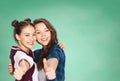 Happy teenage student girls showing thumbs up Royalty Free Stock Photo