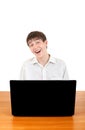 Happy Teenager behind Laptop Royalty Free Stock Photo