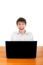 Happy Teenager behind Laptop Royalty Free Stock Photo