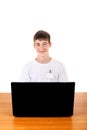 Happy Teenager behind Laptop Royalty Free Stock Photo