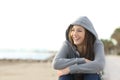 Happy teenager girl looking at side outdoors