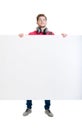 Happy teenager holding a blank banner isolated on white Royalty Free Stock Photo