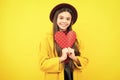 Happy teenager portrait. Valentines Day. Dreaming cute teen child with red heart. Smiling girl. Royalty Free Stock Photo