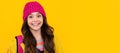 Happy teenager, positive and smiling emotions of teen girl. Children studio portrait on yellow background. Child face Royalty Free Stock Photo