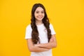 Happy teenager, positive and smiling emotions of teen girl. Portrait of caucasian teen girl with arms folded, isolated Royalty Free Stock Photo