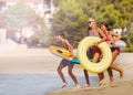 Happy teens spending summertime on the beach Royalty Free Stock Photo