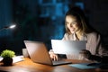 Happy tele worker working in the night at home Royalty Free Stock Photo