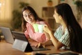 Happy tele workers in the night toasting with coffee cups Royalty Free Stock Photo