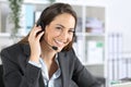 Happy telemarketer posing looking camera at office Royalty Free Stock Photo