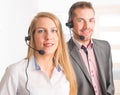 Happy Telephone Operators in call center Royalty Free Stock Photo