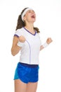 Happy tennis player rejoicing in success Royalty Free Stock Photo