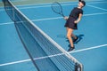 Happy tennis player woman celebrating victory in match point, success and win Royalty Free Stock Photo