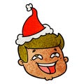 happy textured cartoon of a male face wearing santa hat