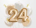 Happy 24th birthday gold foil balloon greeting background.