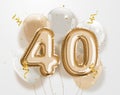 Happy 40th birthday gold foil balloon greeting background.