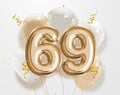 Happy 69th birthday gold foil balloon greeting background. Royalty Free Stock Photo