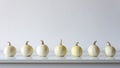 Happy Thanksgiving Background. Selection of little white pumpkins on white shelf against white wall. Modern room decoration. Royalty Free Stock Photo