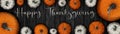 Happy Thanksgiving banner background panorama - Autumn Holiday Harvest still life, Set of various pumpkins on dark black wooden Royalty Free Stock Photo