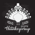 Happy Thanksgiving calligraphy hand lettering with cute turkey on chalkboard background. Vector template for greeting Royalty Free Stock Photo