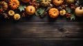 Happy Thanksgiving Day! Autumn background with pumpkins, leaves and berries on dark wooden background. Top view with copy space Royalty Free Stock Photo