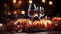 Happy Thanksgiving Day! Autumn still life with pumpkins, berries, leaves and wine glasses