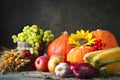 Happy Thanksgiving Day background, wooden table decorated with Pumpkins, Maize, fruits and autumn leaves. Harvest Royalty Free Stock Photo