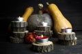 Happy Thanksgiving Day, Decoration on a wooden table with Burning Candles and Pumpkins, Corncob, autumn leaves in the background Royalty Free Stock Photo