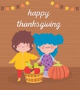 Happy thanksgiving day little girl and boy with basket filled fruits