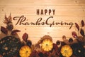 Happy Thanksgiving Day with pumpkin and nut on wooden background Royalty Free Stock Photo