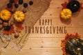 Happy Thanksgiving Day with pumpkin and nut on wooden background Royalty Free Stock Photo