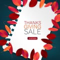 Happy Thanksgiving Day sale poster.  Background with red and orange fall leaves on torn out sheet of paper. American traditional n Royalty Free Stock Photo