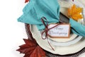 Happy Thanksgiving dining table place setting in Autumn brown and aqua color theme