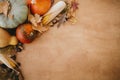 Happy Thanksgiving flat lay. Pumpkins, autumn leaves, corn, walnuts,chestnuts,acorns on rustic wooden table with space for text. Royalty Free Stock Photo