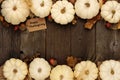 Happy Thanksgiving gift tag with double border of white pumpkins over wood