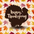 Happy Thanksgiving. Hand drawn lettering on background with leaves and turkey silhouette. Design element for poster, card, banner. Royalty Free Stock Photo