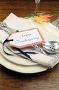 Happy Thanksgiving individual dinner table place setting - vertical. Royalty Free Stock Photo