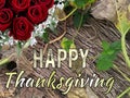 Happy Thanksgiving Massage, Greeting Card, Wishes, Holiday Celebration With flower Roses And Autumn Leaves. Royalty Free Stock Photo