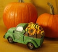 Happy thanksgiving, green truck, sunflower delivery, orange pumpkins