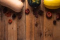 Happy Thanksgiving. Pumpkins, cones and dry leaves on a wooden background. View from above. Flat layer Royalty Free Stock Photo